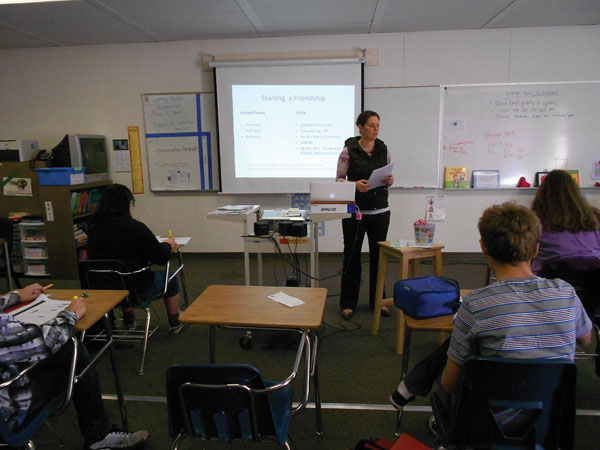 Hard at Work: Rachael Kaci starts her fifth period class off with a presentation. In her first year as a high school teacher, Kaci is the sole teacher for Academic Communications.   