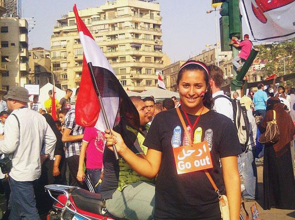 Salem at protests in Tahrir Square on July 3, the day President Morsi was deposed. deposed by the Egyptian military. Salem and her friend went to celebrate the removal of Morsi and the Muslim Brotherhood from power. 