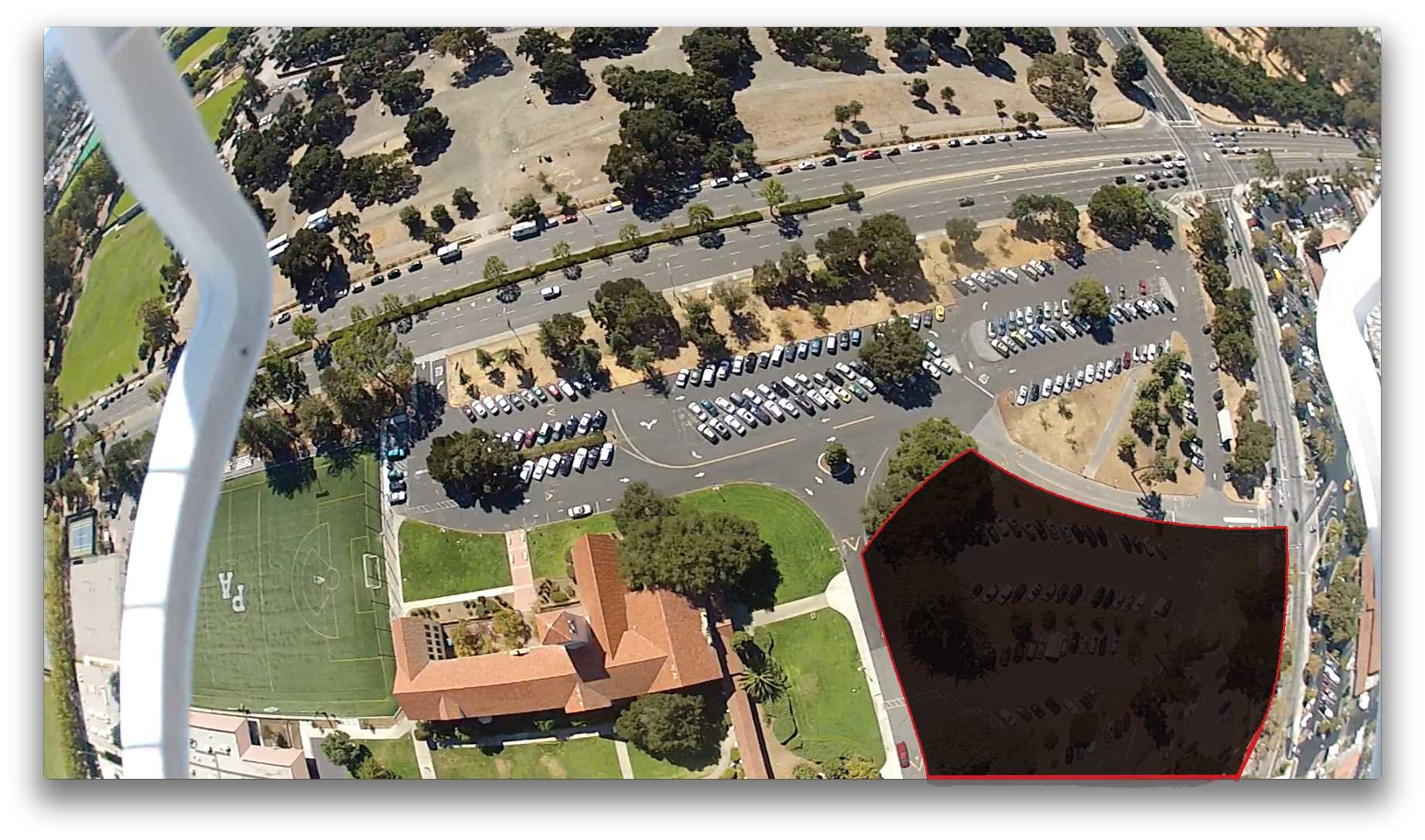 Construction in the upcoming school year will block off a large area of Palo Alto High Schools parking lot. Tower building pictured in bottom left. Photo by Max Bernstein with the Paly Voice Drone