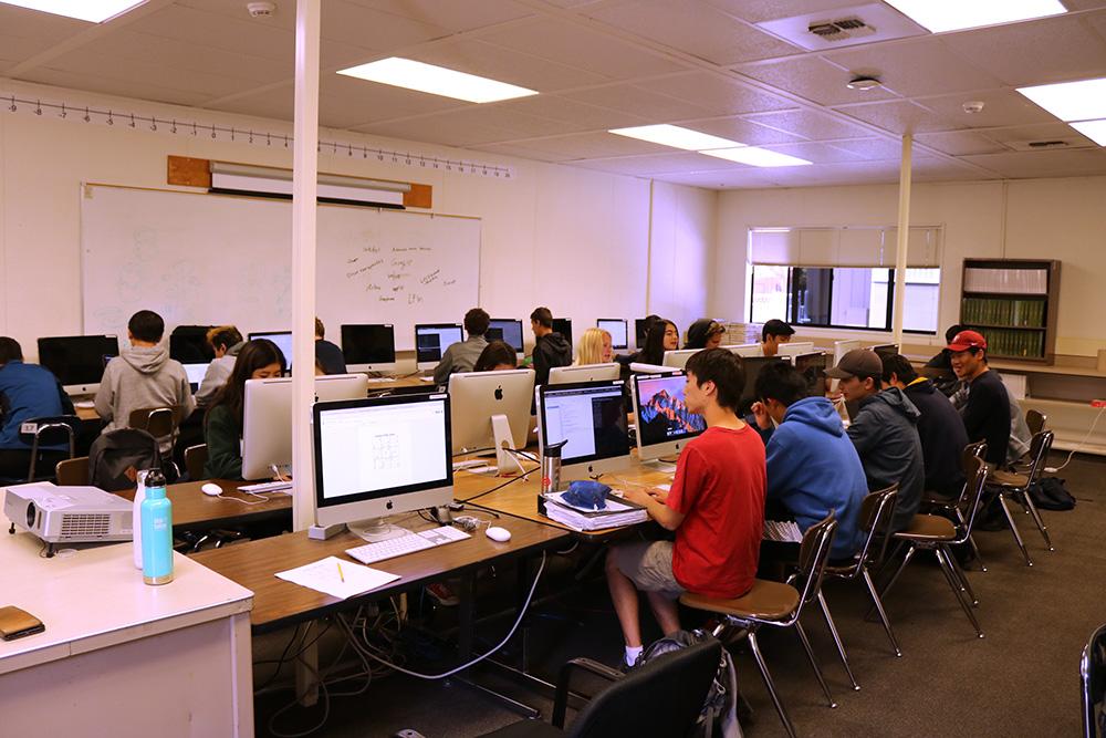 CODING THE FUTURE Computer science students work on individual projects in Will Friebels sixth period Object-Oriented Programming class. To Friebel, learning computer science is much more than taking a high school course. Every industry in the world now uses computer science, he said. Understanding computer science gives people access to understand how the world works at this time. Photo by Alex Feng