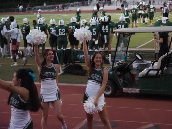 ONE CHEER AT A TIME — Palo Alto High School cheerleaders rally for victory no matter the score. 