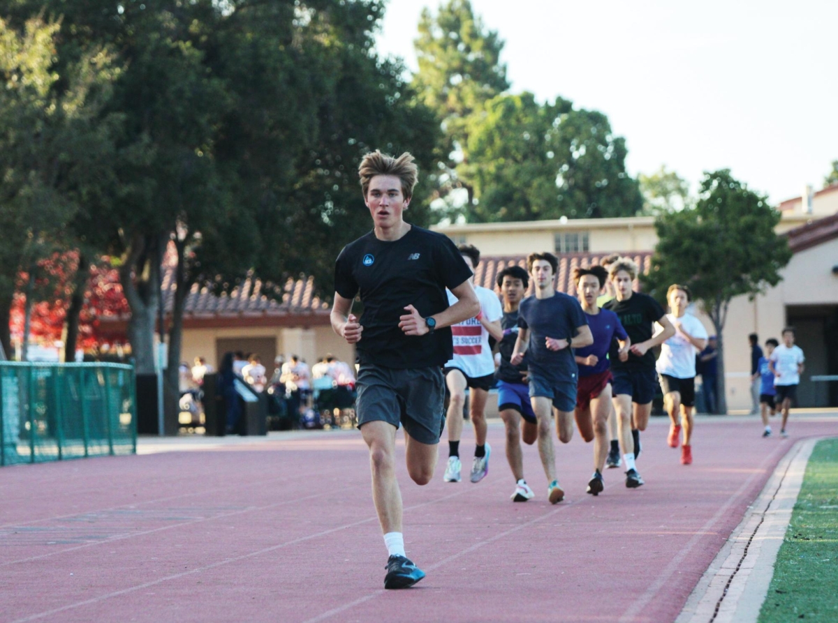 RUNNING AHEAD — Palo Alto High School senior Grant Morgenfeld runs during practice to rehab his stress fracture on his shin. The comeback right now this cross country season has been a little rough. Morgenfeld said.