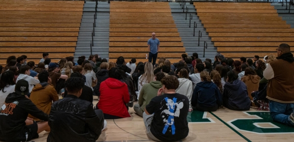 COMMUNITY BUILDING – Educator and head of Breaking Down the Walls Jason Jedamski gives a speech to a group of students. “It was very, very much a community building experience,” said Palo Alto High School sophomore Max Soparkar.