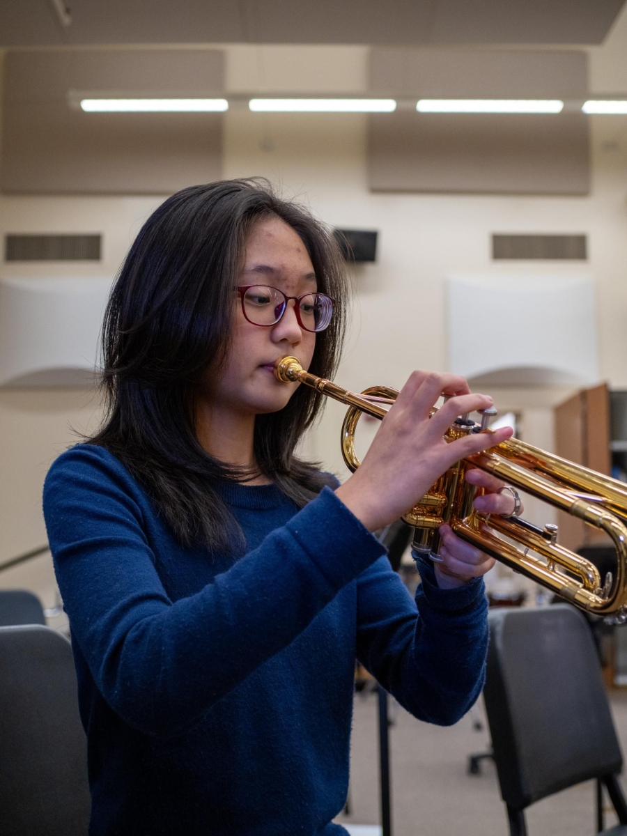 DIGITAL DISTANCE — In place of mindless scrolling, Paly sophomore Michelle Park instead focuses on her passion for playing the trumpet. “Phones take up most of your day,” Park said. “Once you open something on your phone, you just don’t want to leave it.”