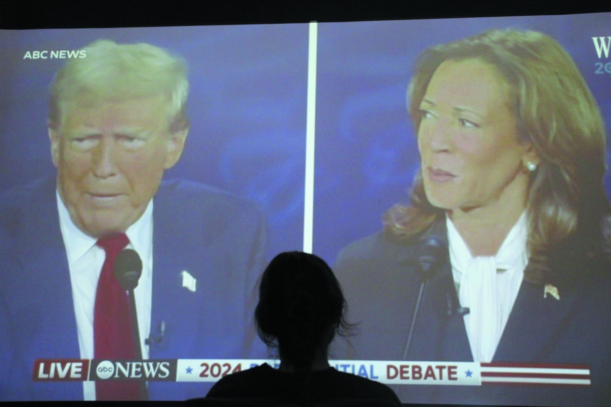 LOOKING TOWARDS THE FUTURE — A Paly student watches the presidential debate between Kamala Harris and Donald Trump on Sept. 10. “To connect with young people I think they [the presidential candidates] should genuinely listen to them,” junior Duncan Sego said.