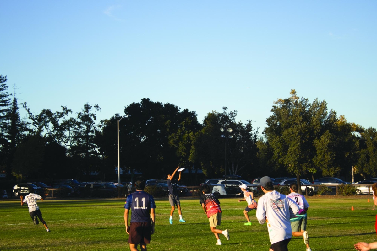 FLOATING FRISBEES — The ultimate frisbee team, Control, practices on a Tuesday afternoon. Anush Patel, a sophomore who plays on the team, aspires to play pro ultimate one day. “I definitely want to play college and then probably pro,” Patel said.  