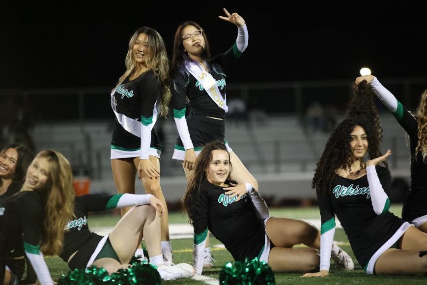 LAST DANCE — Palo Alto High School varsity dancers pose after completing their halftime performance.