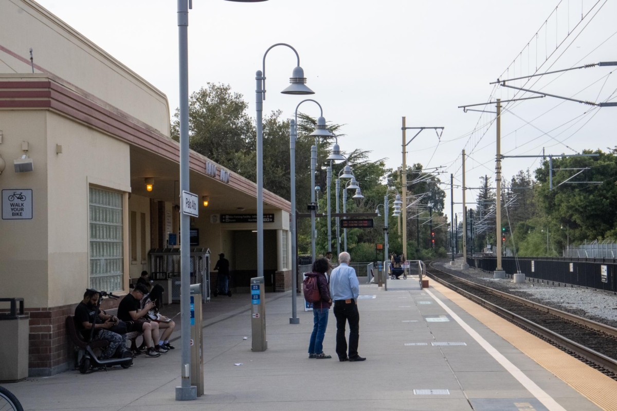 THE PLATFORM — People wait for a train at the University Avenue Caltrain station. Trains stop every 15 minutes, but this may change. “If they cut service, it’s definitely one less option for me and others to get around,” Palo Alto High School freshman Neel Jonnala said.