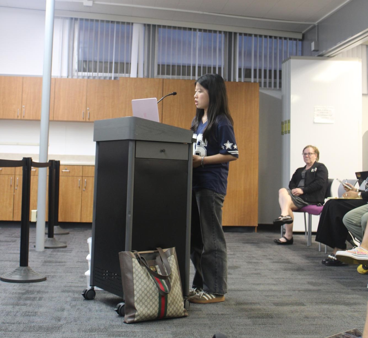 STUDENT REPS - Palo Alto High School sophomore Helen Li addresses the Palo Alto School board at the May 12 board meeting after the selection of the community panel for the superintendent interview process. “We truly want to emphasize how important student voice is in any school board process,” Li said.
